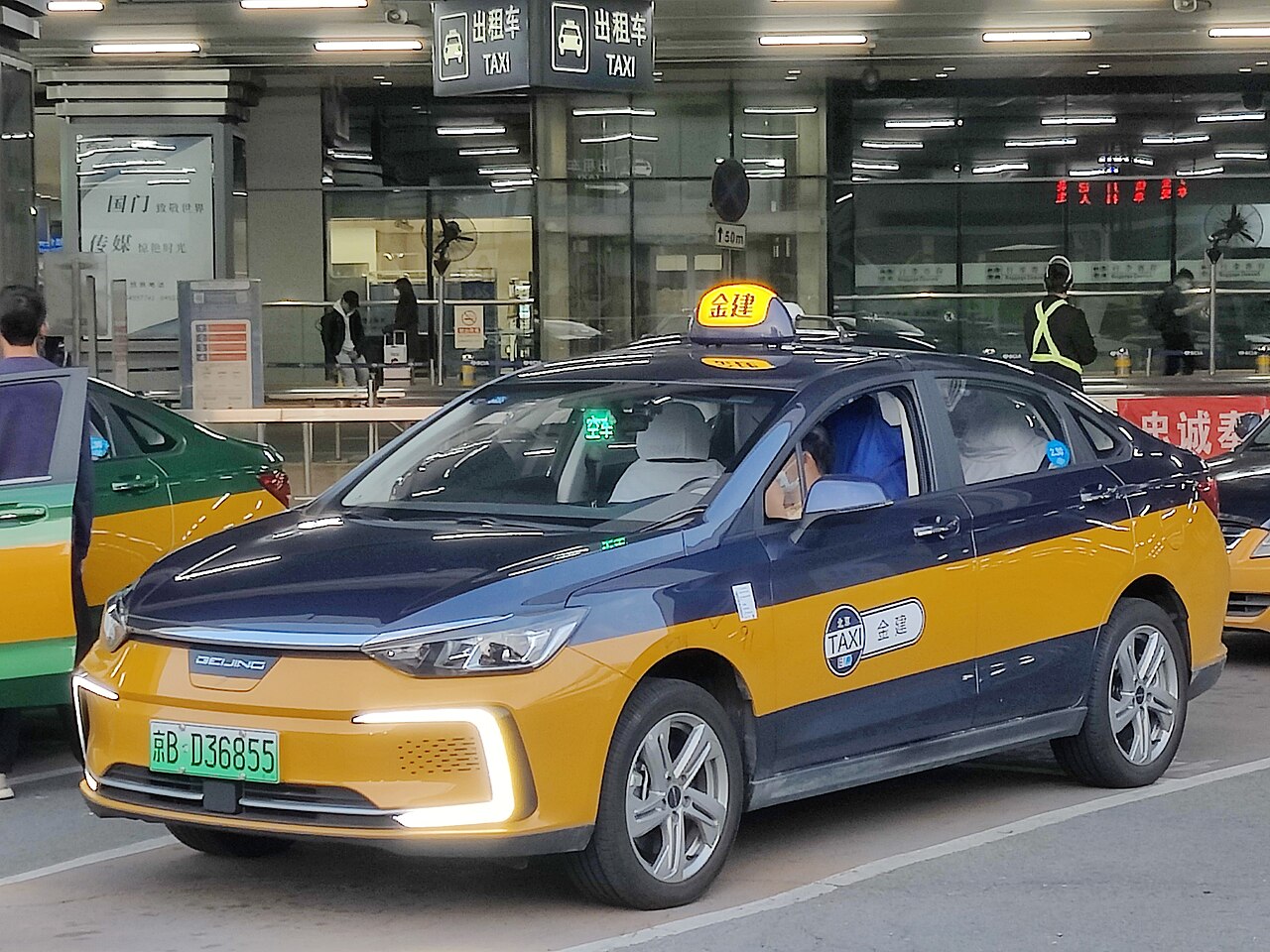 A Beijing taxi at the airport terminal